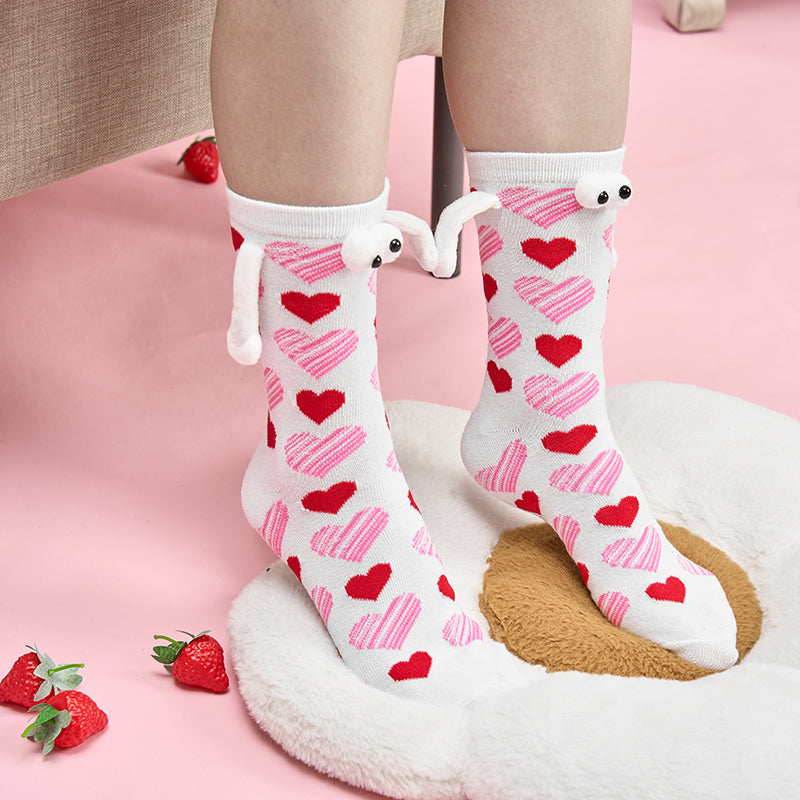 Paar Liebe Magnet hält Hände Socken