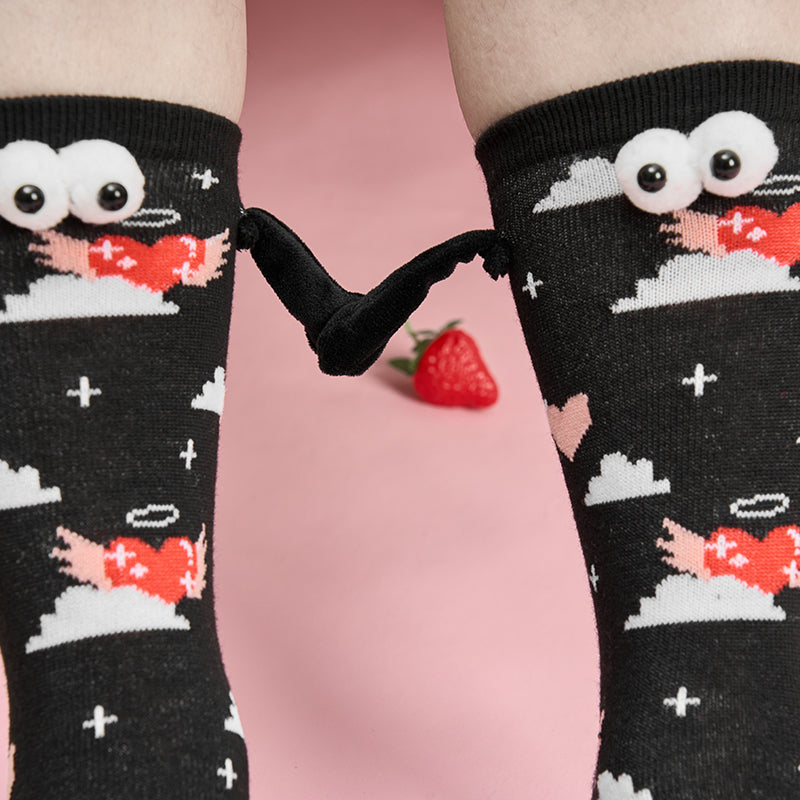 Paar Liebe Magnet hält Hände Socken