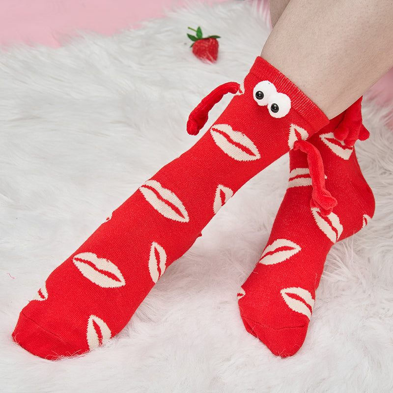 Paar Liebe Magnet hält Hände Socken