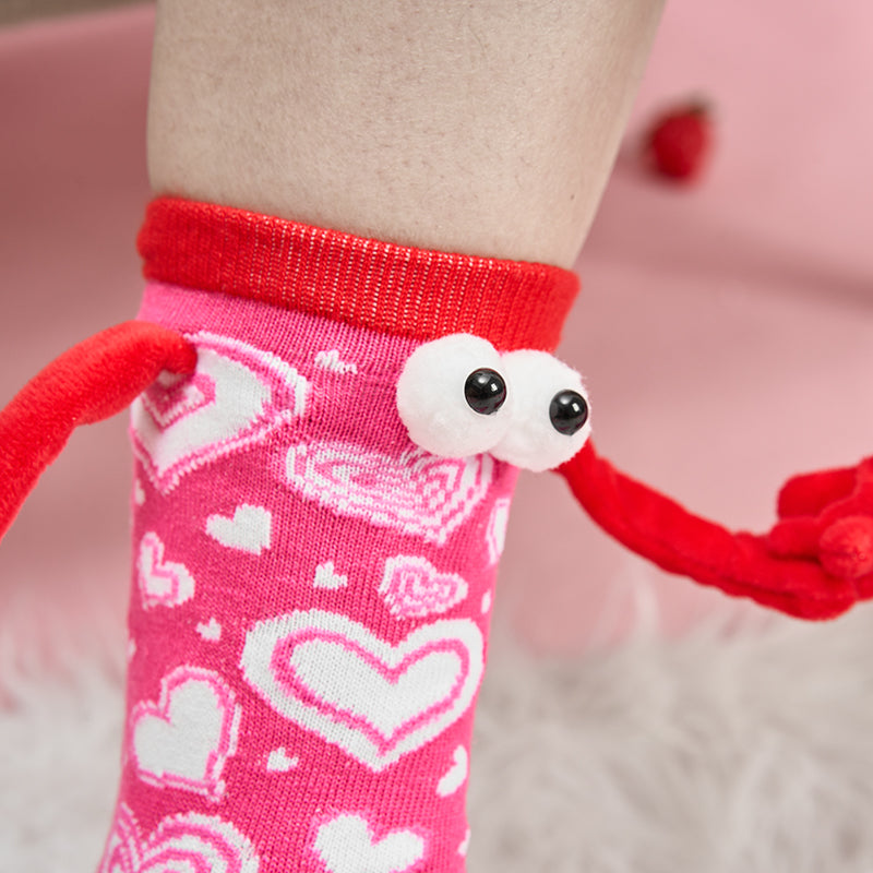 Paar Liebe Magnet hält Hände Socken