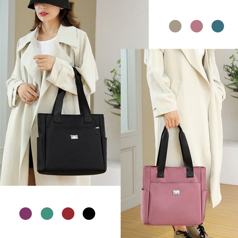 👜👜Vielseitige einfache einfarbige Nylonhandtasche mit großer Kapazität
