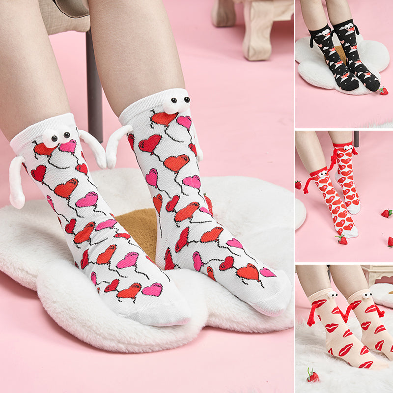 Paar Liebe Magnet hält Hände Socken