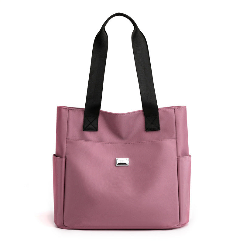 👜👜Vielseitige einfache einfarbige Nylonhandtasche mit großer Kapazität
