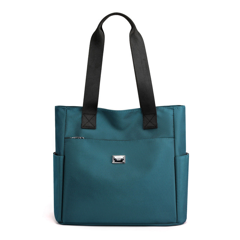 👜👜Vielseitige einfache einfarbige Nylonhandtasche mit großer Kapazität