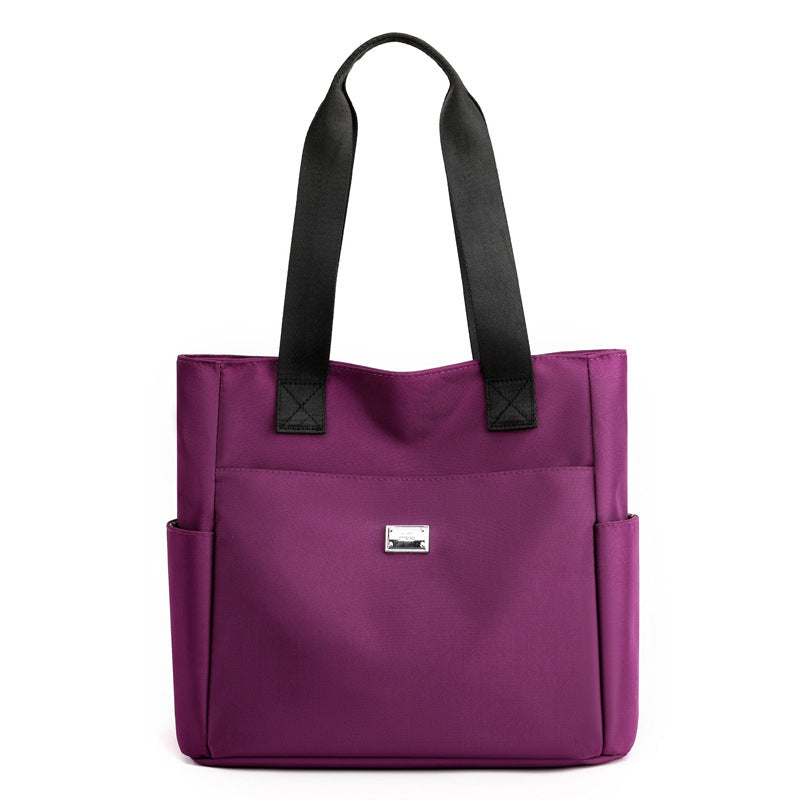 👜👜Vielseitige einfache einfarbige Nylonhandtasche mit großer Kapazität