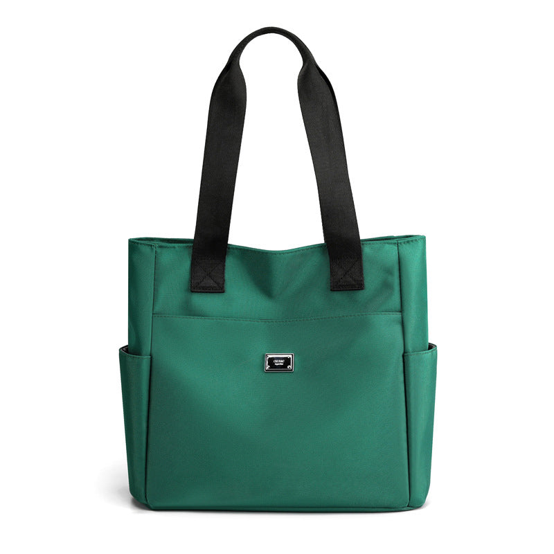 👜👜Vielseitige einfache einfarbige Nylonhandtasche mit großer Kapazität